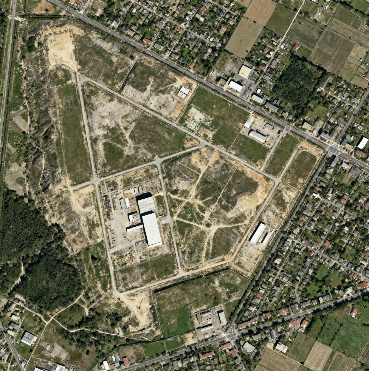 Orthomosaic imaging provides substantial benefits over conventional tools like Google Maps, offering the potential for more accurate measurements. By using small drones with high-resolution cameras, numerous images can be taken from diverse angles to cover extensive areas. These images are then combined into a unified orthomosaic, delivering a detailed and precise view of the site. This technology enables professionals to evaluate and measure the site's characteristics and dimensions with greater accuracy, all from the comfort of their office. The resulting orthomosaic offers valuable insights across industries such as construction, surveying, and urban planning, improving efficiency and decision-making.